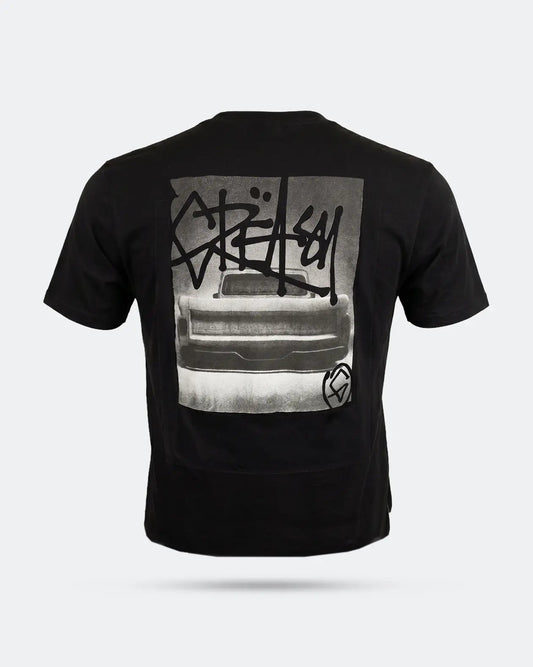 Black t-shirt with a automotive graphic design on the back against a white background - The Tailgate Black automotive graphic tee by Greasy Hands Society