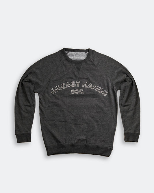 Dark gray sweatshirt with 'Greasy Hands Soc' text on a light gray background