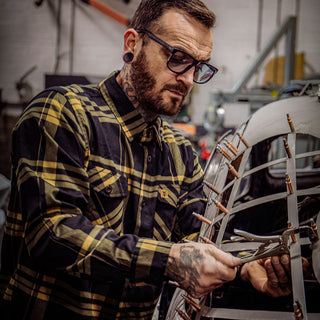 two lane black and gold flannel on a model