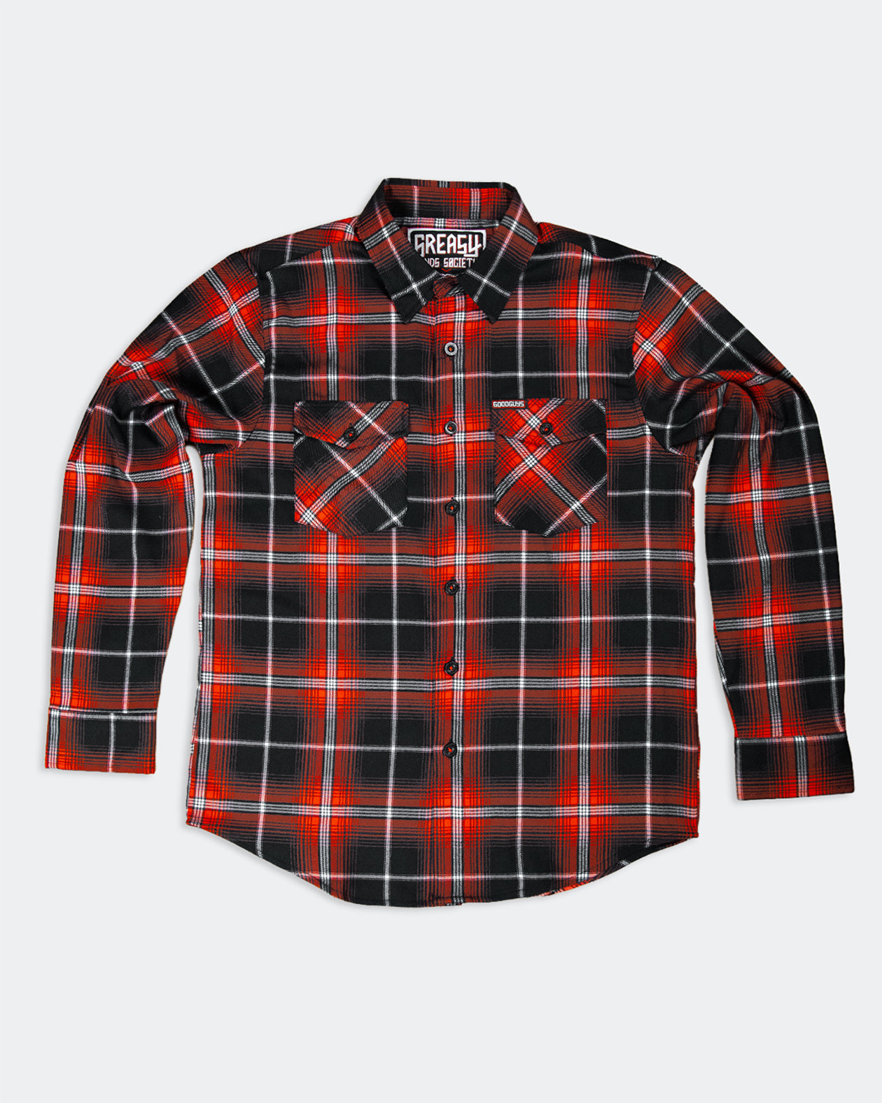 flat lay view of a red black and white flannel called the detour flannel on gray