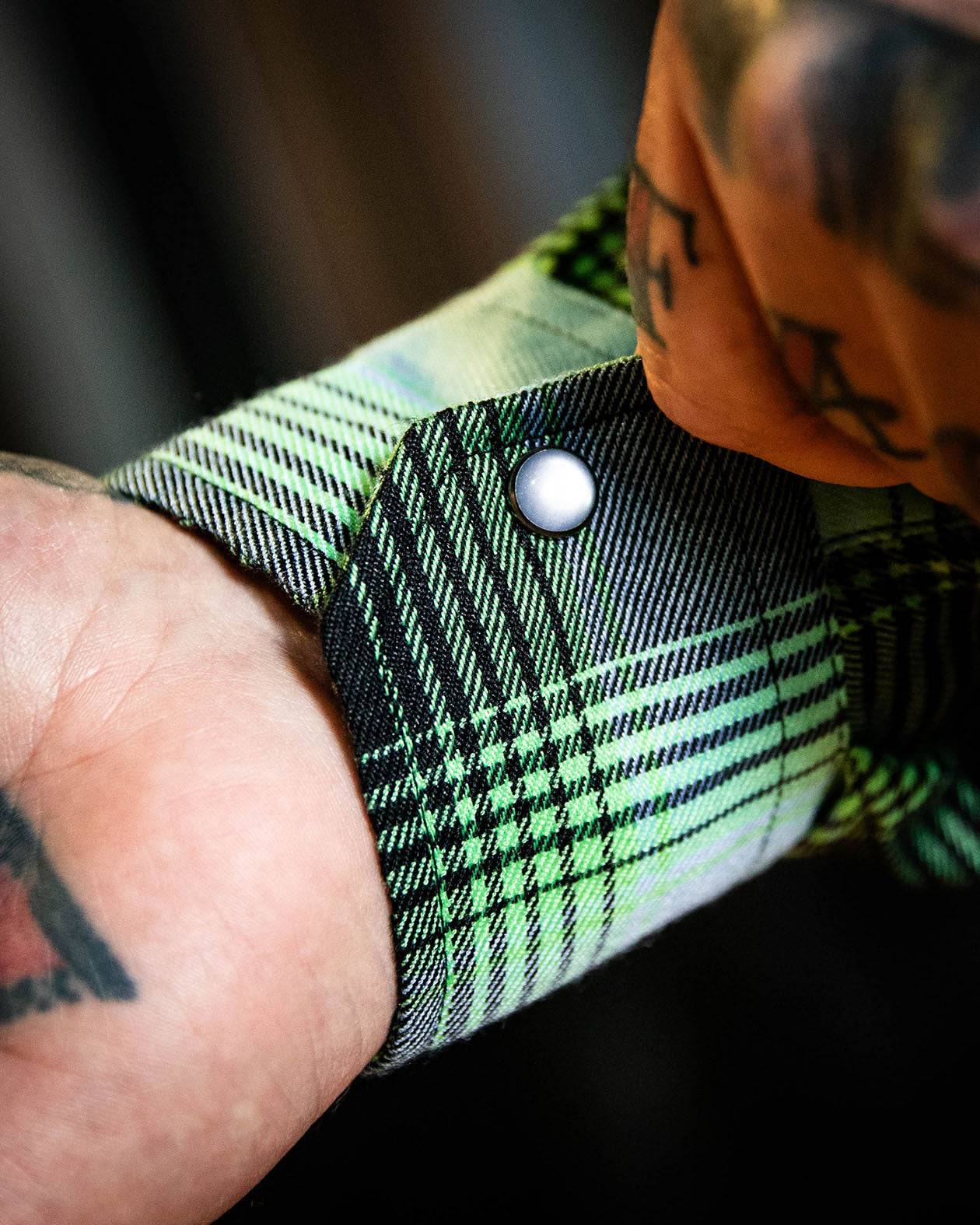 sucker punch blue and green flannel showing the barrel cuff in detail