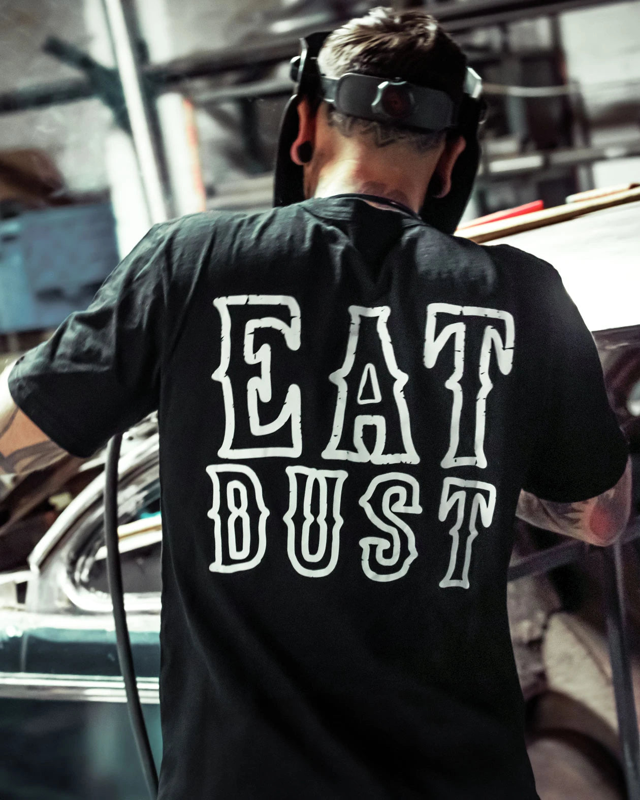 eat dust full back graphic of the words 