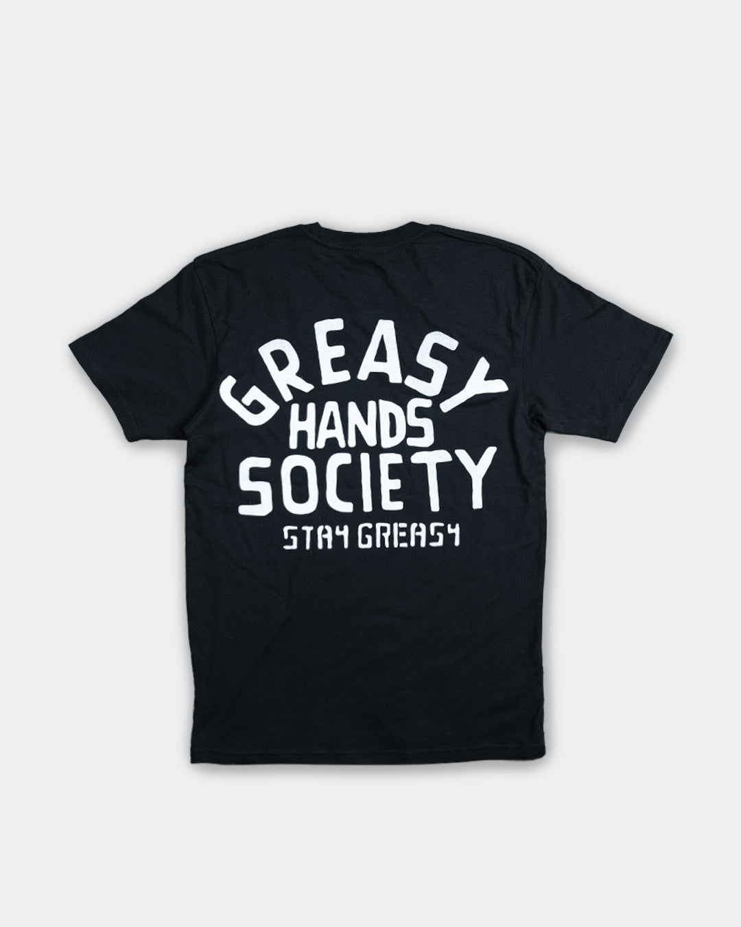 Black t-shirt with 'Greasy Hands Society Stay Greasy' text on a white background - factory sealed men's graphic tee