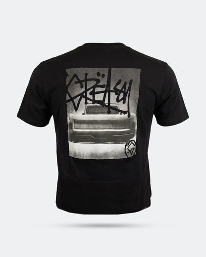 Black t-shirt with a automotive graphic design on the back against a white background - The Tailgate Black automotive graphic tee by Greasy Hands Society