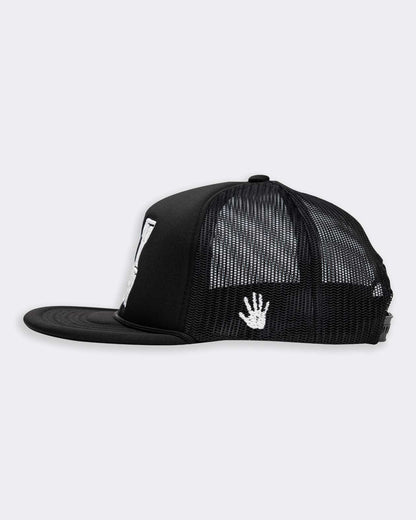 eat dust white text on black trucker hat side view