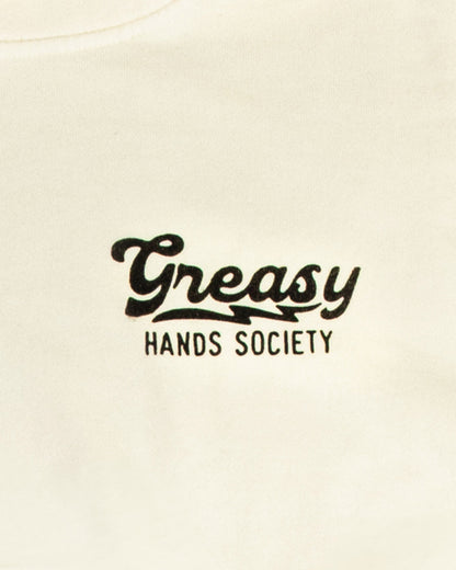 Text 'Greasy Hands Society' on a beige shirt for the destination hoodie