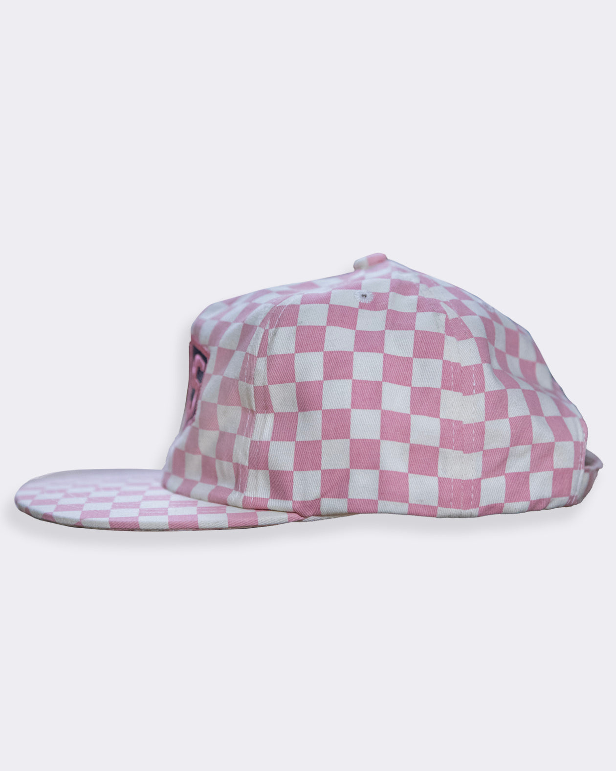 greasy hands society's momentum pink checkerboard hat sideview