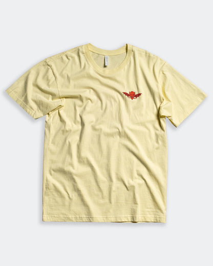 devil is in the details yellow t-shirt front graphic fview with left chest graphic of a devil