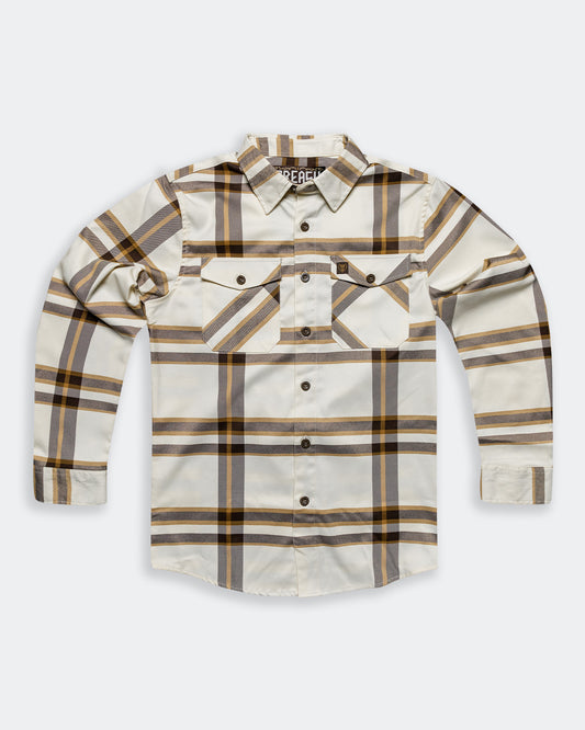 The Whiskey Flannel cream brown and gold flannel flat lay on gray 