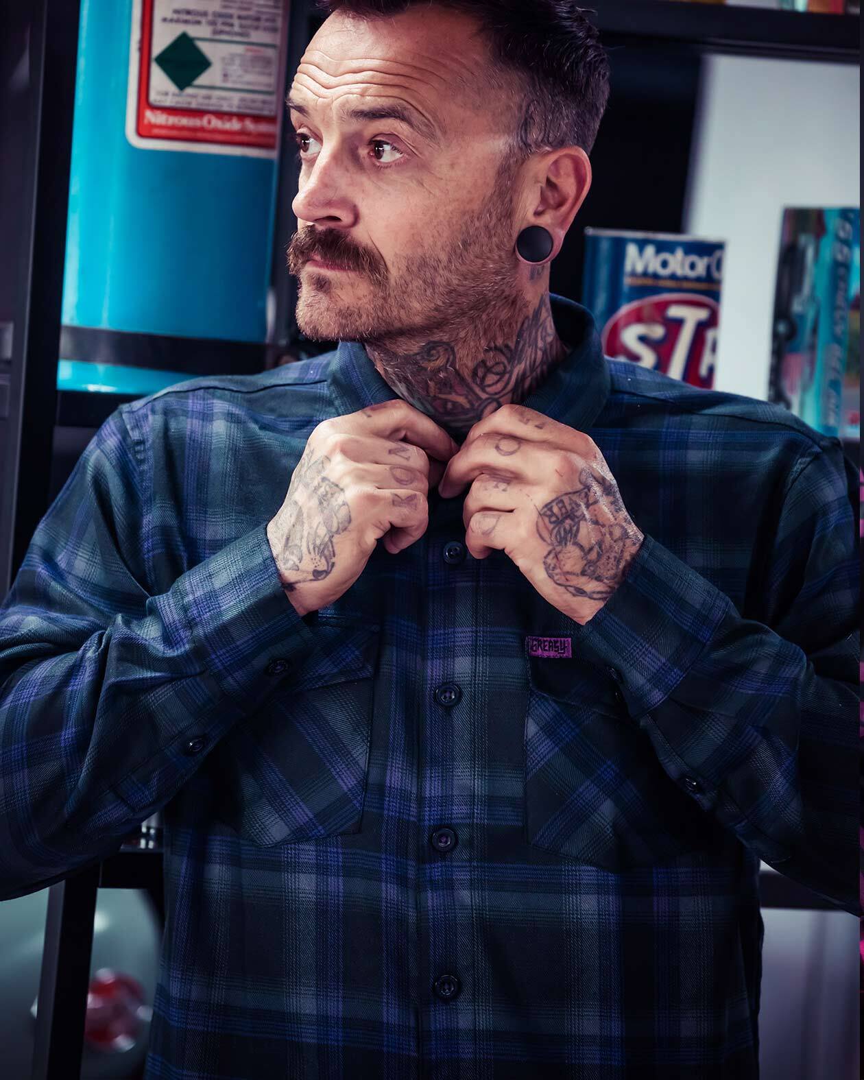 kiss the sky black and purple flannel on a model black, purple and silver plaid pattern