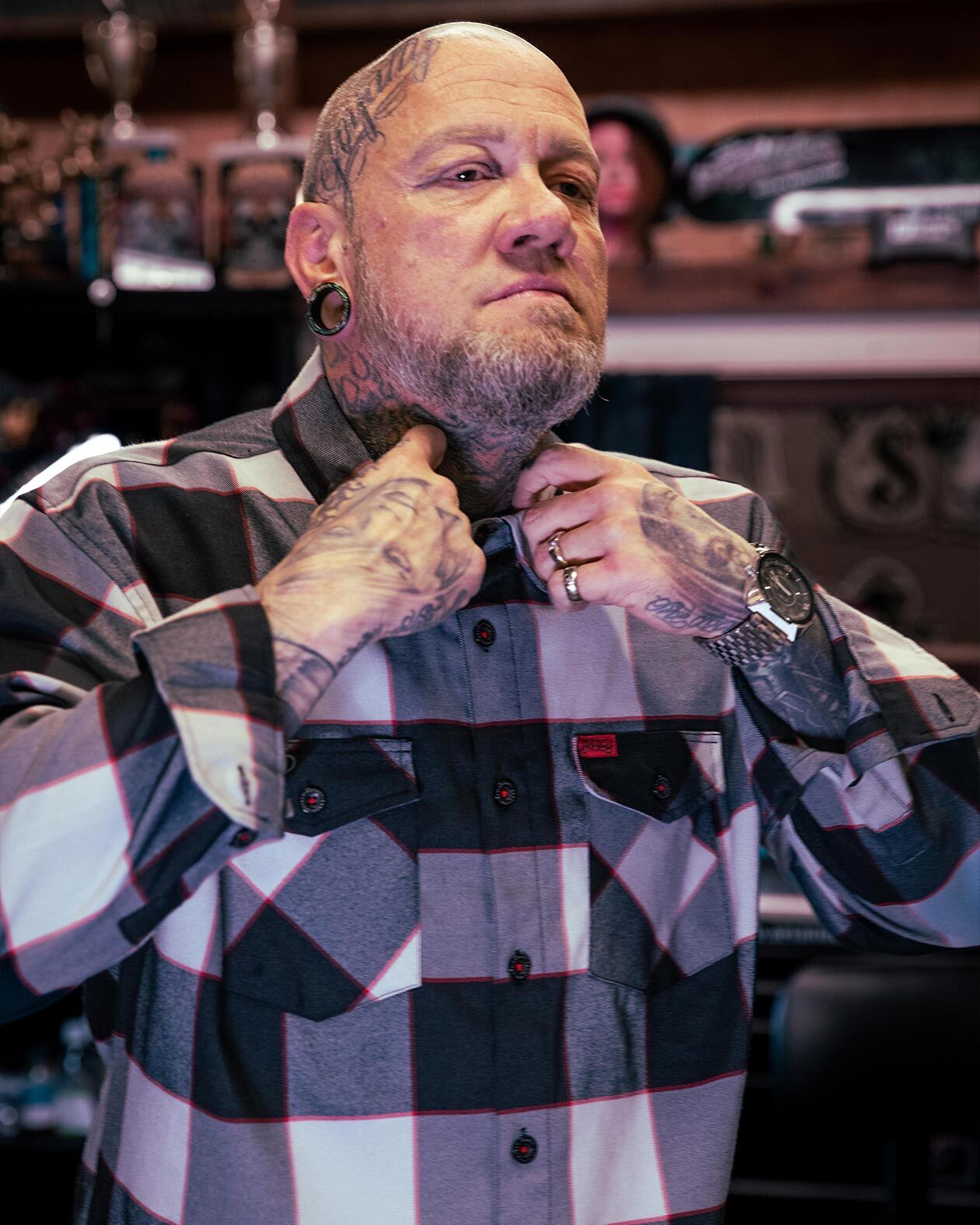 the banger black gray and red flannel  Billyjack Gunter showing off the collar